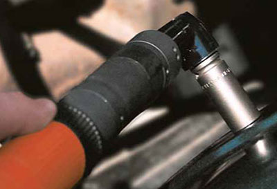 Close-up photo of a Cleco angle nutrunner driving a fastener.